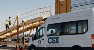 CSX Total Distribution Services’s autonomous electric shuttle in action at Selkirk Auto Terminal in New York. (Screen Grab from CSX Video)